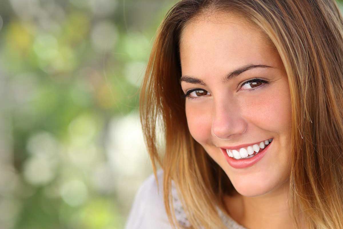 An attractive woman smiling